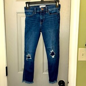 EUC size 9/10 Abercrombie girl jeans. Holes have patches under. Fray at bottom.